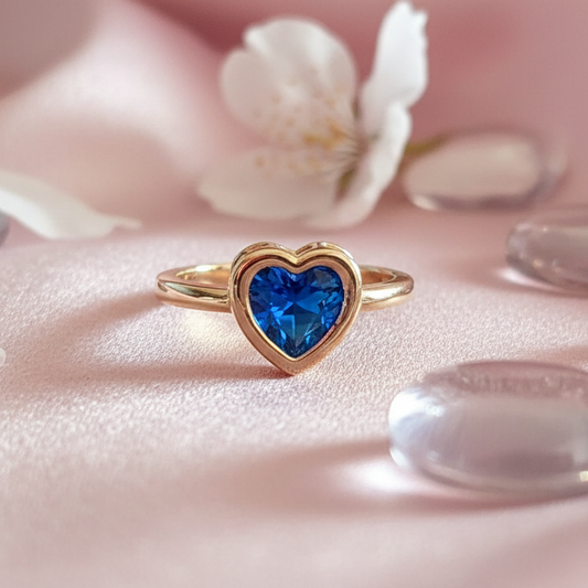 Heart-shaped blue gemstone ring